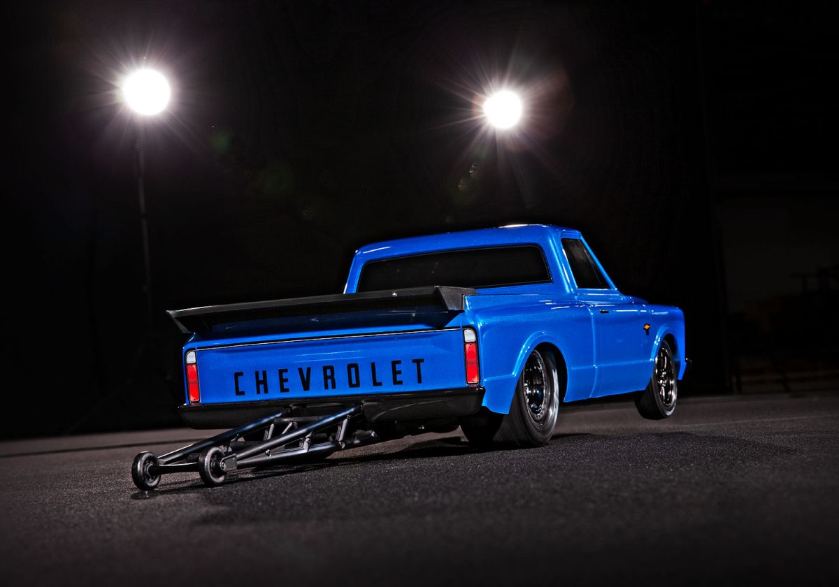 Traxxas Drag Slash Chevy C10 Blue - Rear action shot with wheelie bar