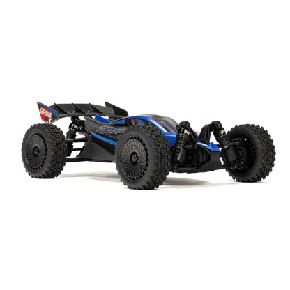 ARRMA Typhon Grom BLX red/black action shot on dry grass